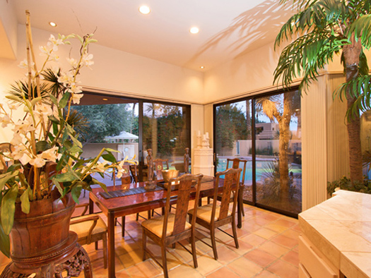 dining area with views of pool 